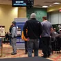 Players line up to register for a $250 MSPT qualifier.