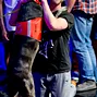 Trevor Pope is greeted by his dog, Revis, after winning event 02 at the WSOP.