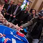 Fabrice Soulier shakes hands with Anatoly Filatov after beating him heads up