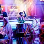 Cirque du Soleil drummers perform on the ESPN Final Table stage