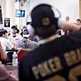 Daniel Negreanu and Phil Hellmuth with friendly banter between tables. 