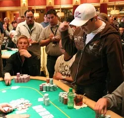 Mortensen pumps his fist as he makes a full house on the turn