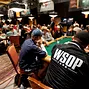 A player wears a WSOP jacket while competing in Event 03B