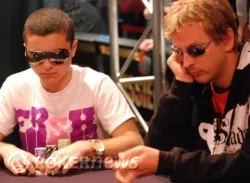 "JJProdigy" and Phil Laak, once seated side-by-side at Table 31