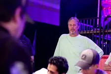 Paul Gilbert watched Phil Hellmuth in the Amazon Room.