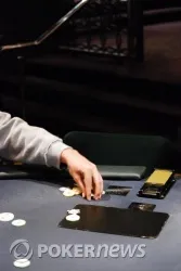 Tom Dwan's stack in the process of being blinded off