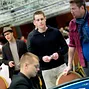 Players queue for their table draw