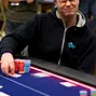 Juha Helppi grimaces after making a call & shown the winning hand
