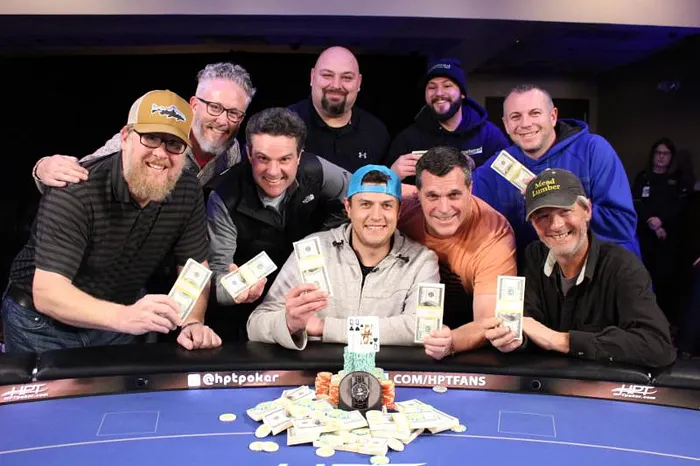 Mike Englert celebrates his win with friends.