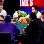 Daniel Negreanu lowers his head when he sees the turn.