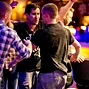 Trevor Pope is mobbed by his friends after winning the WSOP gold bracelet in event 02.