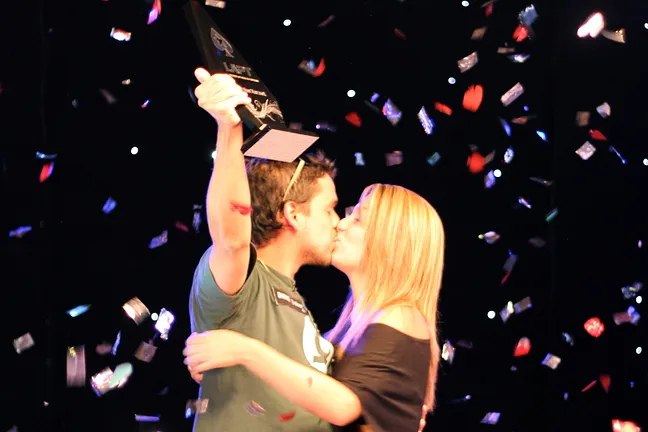 A trophy, a ton of money and a kiss from a beautiful woman... it's good to be the champ!
